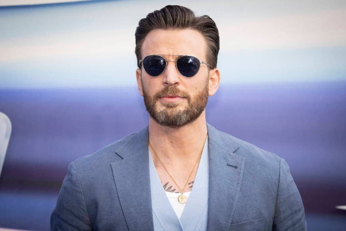 Chris Evans poses for photographers upon arrival for the premiere of the film 'Lightyear' in Lo ...