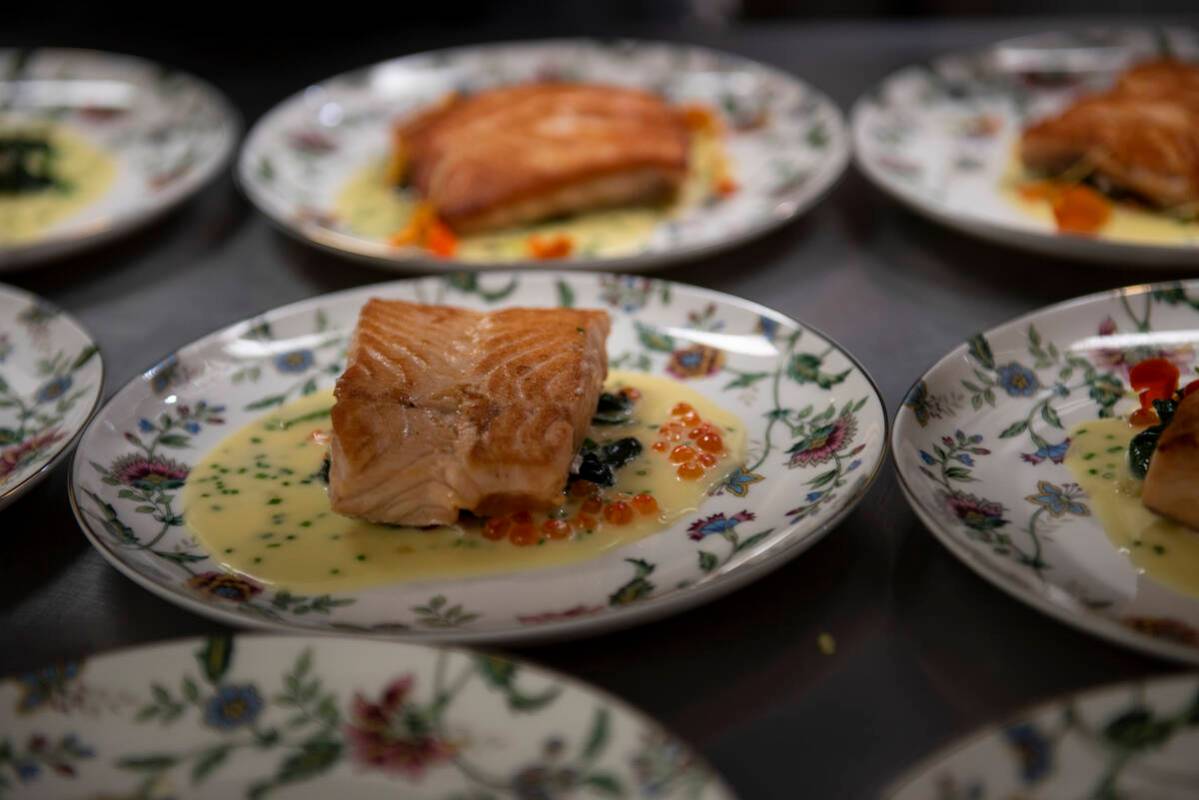 The third course, Madre i Hijo – chargrilled salmon with caviar sabayón and Bloomsdale spina ...