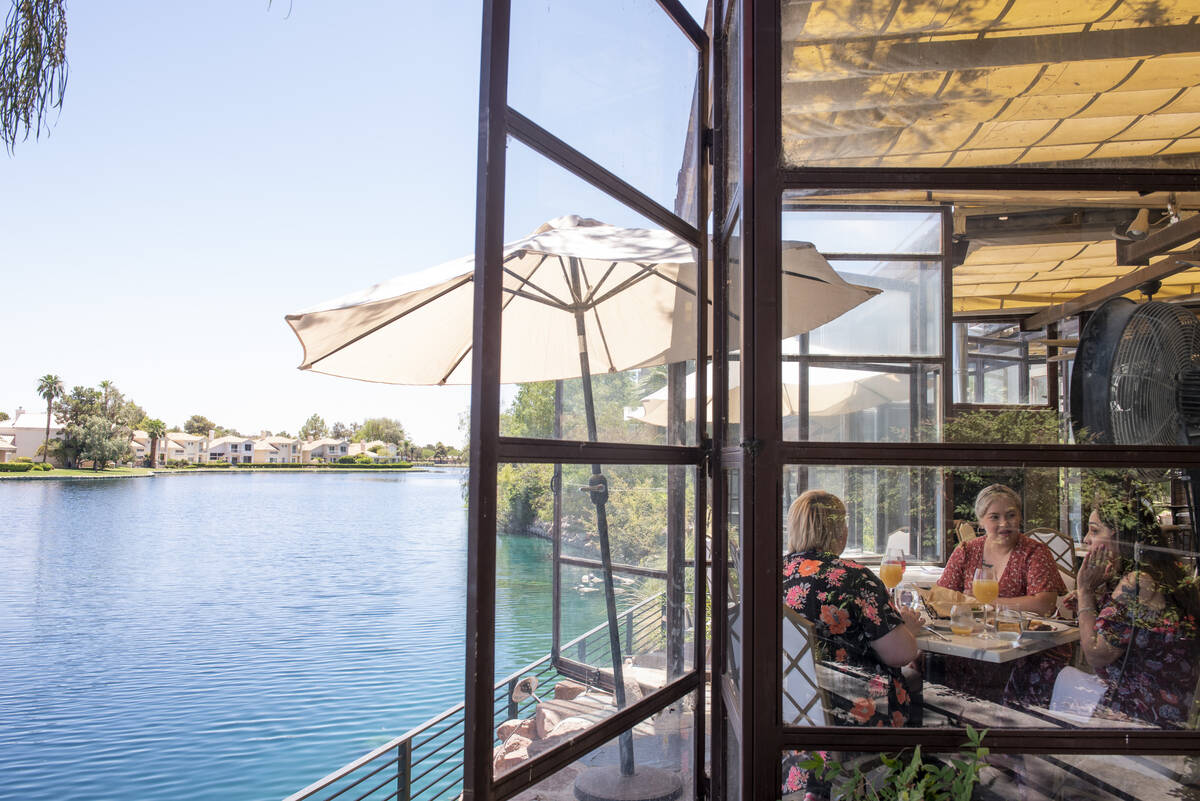 Carli Medina, from left, Ana Peña and Annette Gudino eat lunch on the lakeside patio at Ma ...