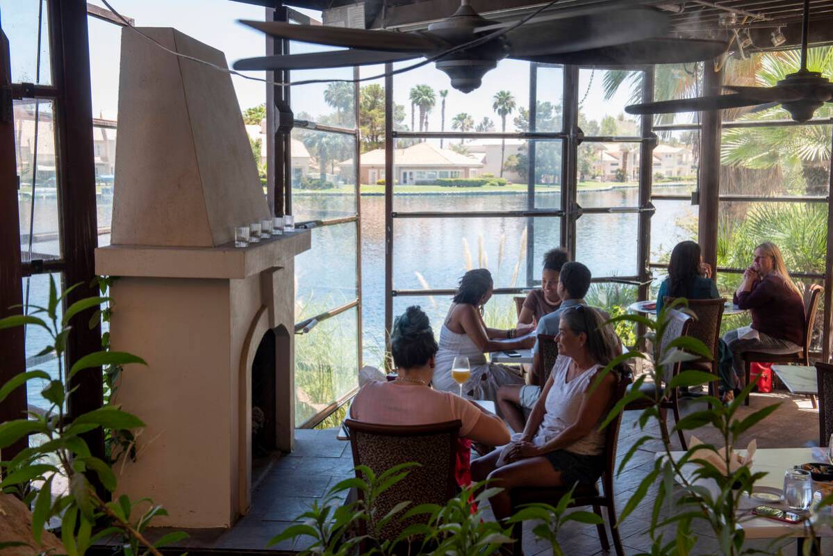 Diners eat lunch on the lakeside patio at Marché Bacchus on Wednesday, June 15, 2022, in L ...