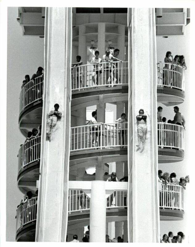 Two riders race to the bottom of a slide at Wet 'n' Wild on Las Vegas Boulevard in 1988. (Las V ...