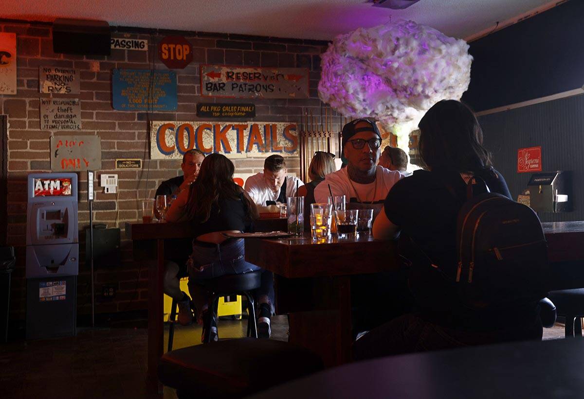 Customers are seen at Atomic Liquors, Saturday, June 18, 2022, in Las Vegas. (Chitose Suzuki / ...