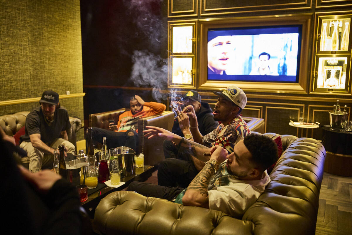 Members of the Golden State Warriors celebrate their NBA championship at Eight Lounge at Resort ...