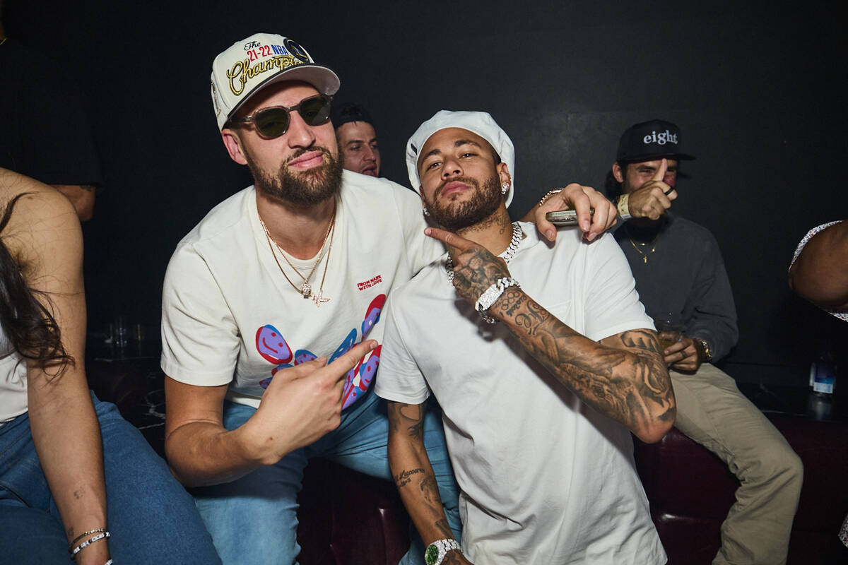 Klay Thompson is shown with soccer star Neymar da Silva Santos Jr. during the Golden State Warr ...