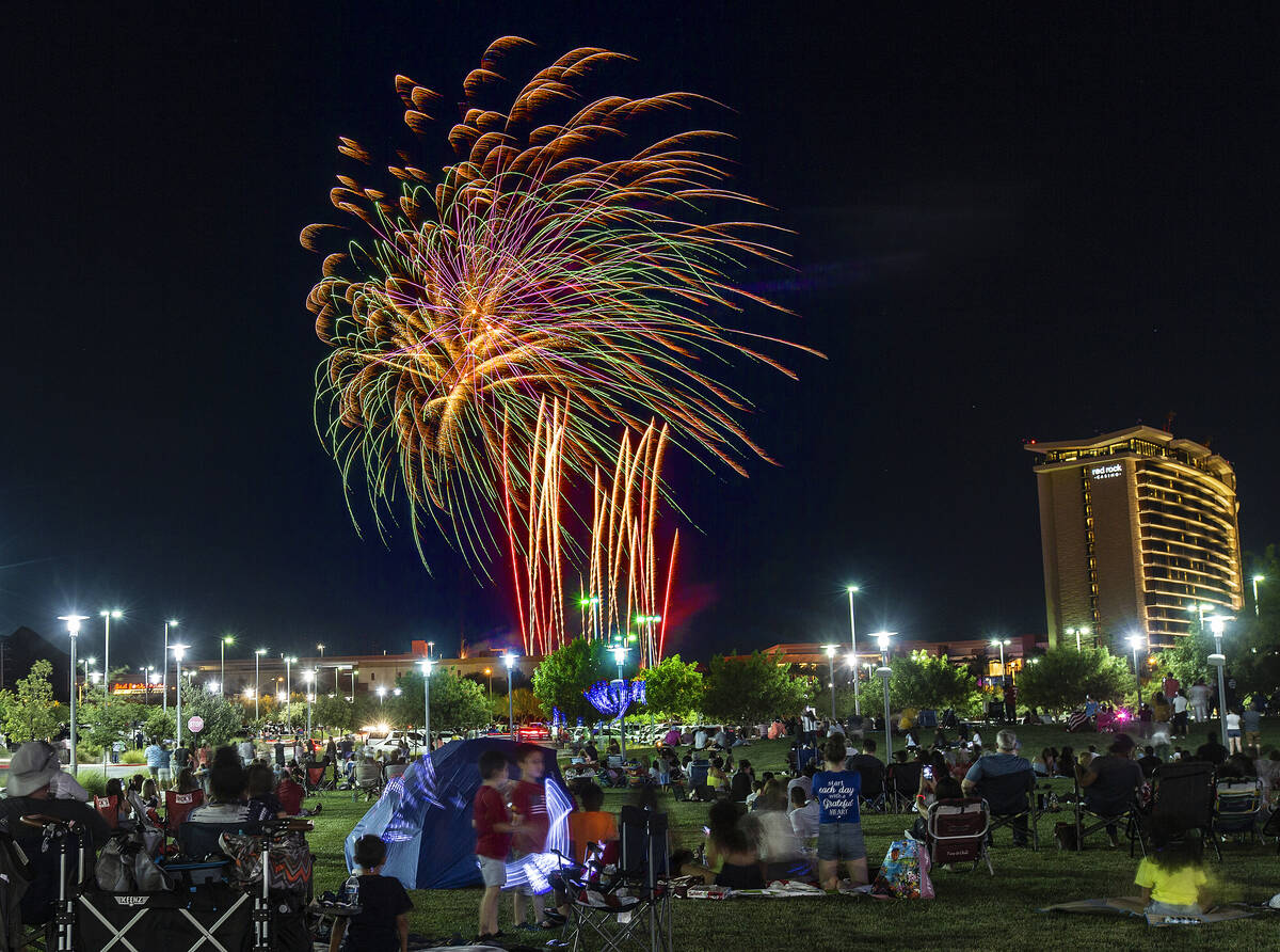 People watch the Red Rock Casino fireworks show from Downtown Summerlin on Saturday, July 4, 2 ...