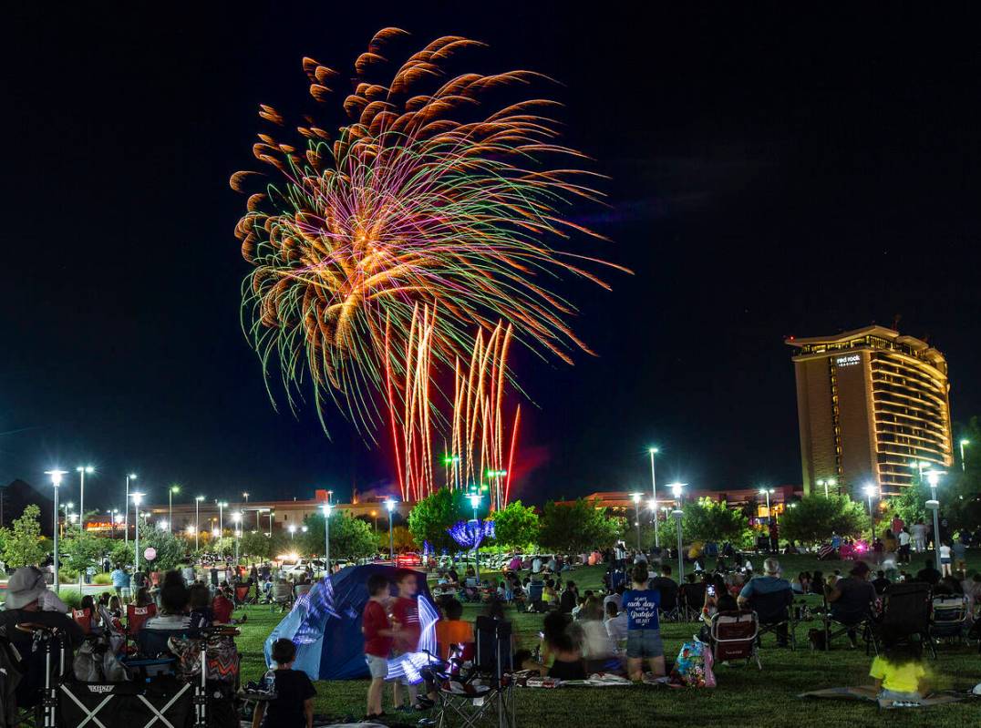 People watch the Red Rock Casino fireworks show from Downtown Summerlin on Saturday, July 4, 2 ...