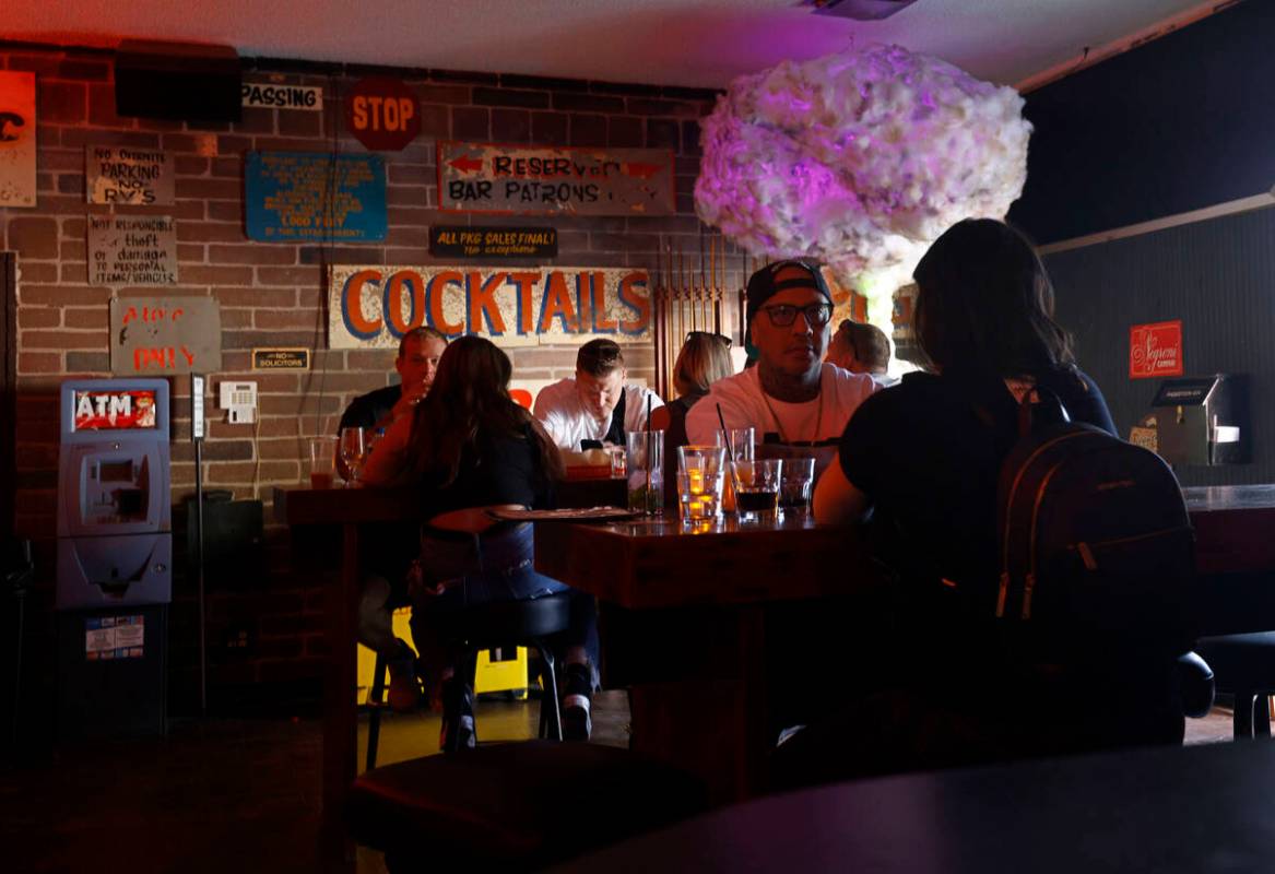 Customers are seen at Atomic Liquors, Saturday, June 18, 2022, in Las Vegas. (Chitose Suzuki / ...