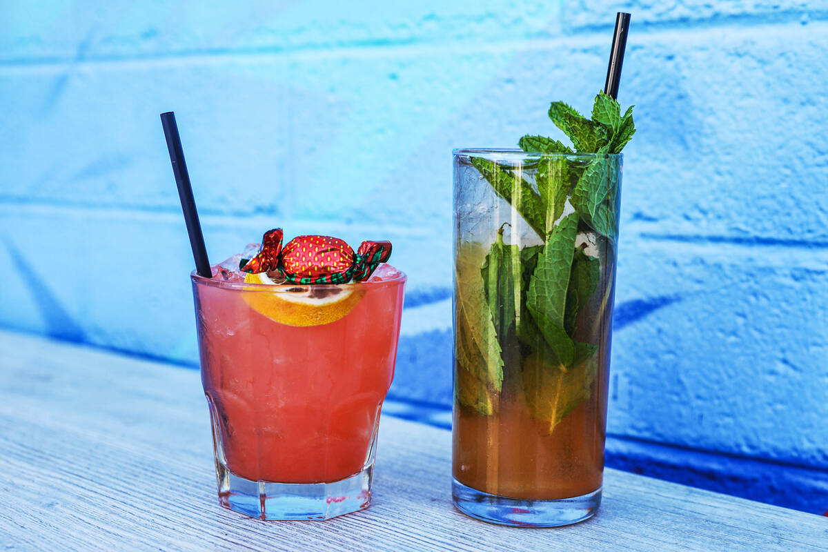 The Strawberry Fields cocktail, left, and the Hunter S. Mash cocktail, right, at Atomic Liquors ...