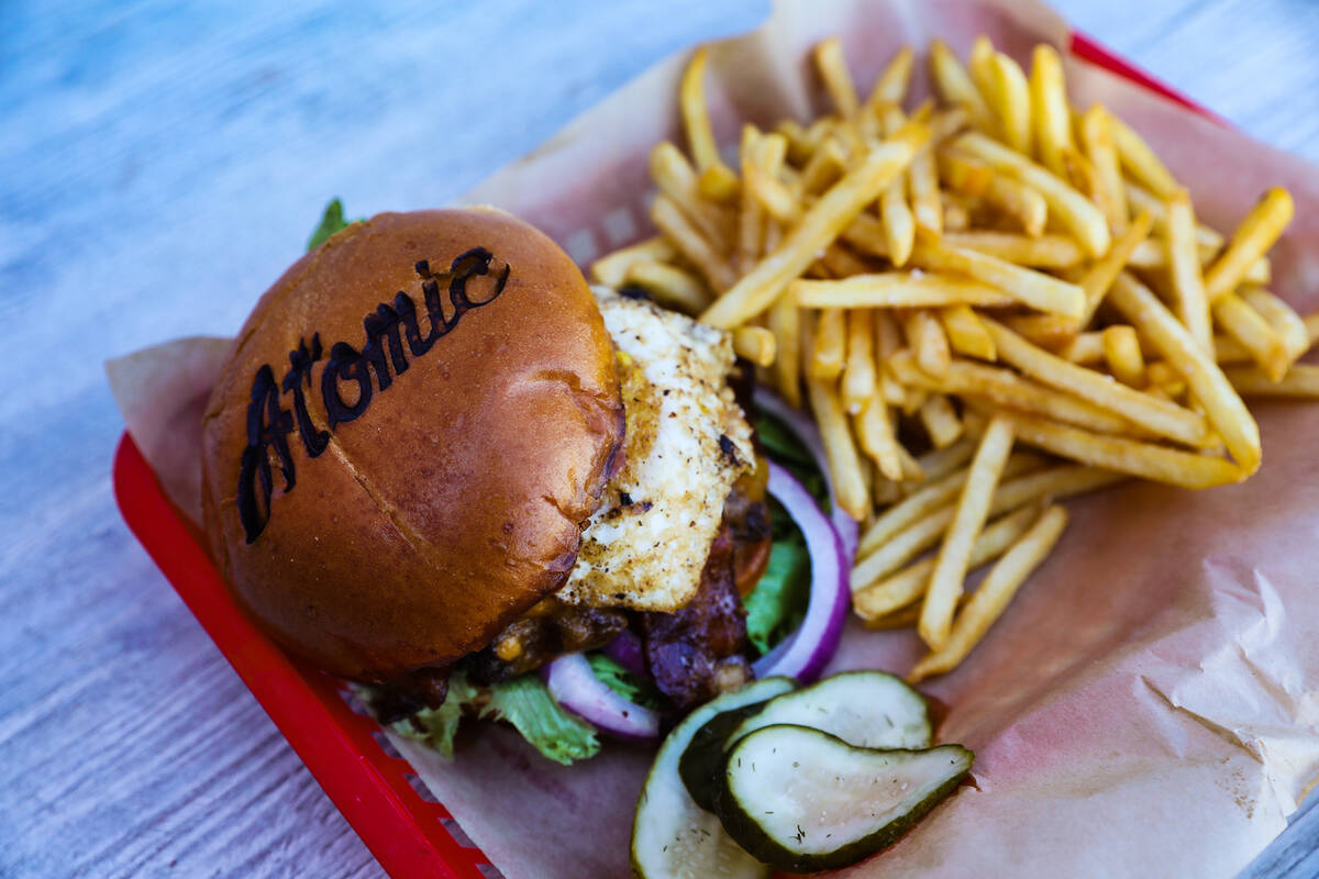 The old crow bourbon BBQ bacon burger at Atomic Liquors in Las Vegas, Wednesday, June 15, 2022. ...