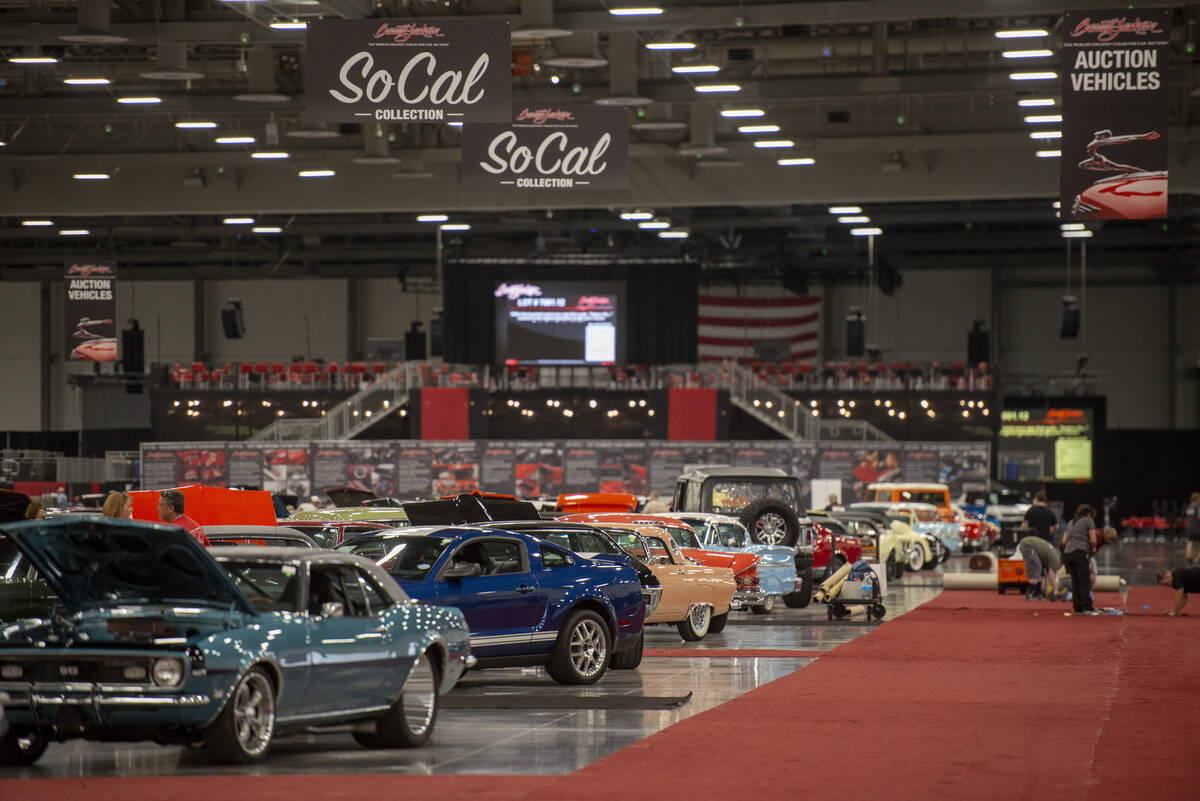 Cars line the convention hall floor for the Barrett-Jackson car auction at the Las Vegas Conven ...