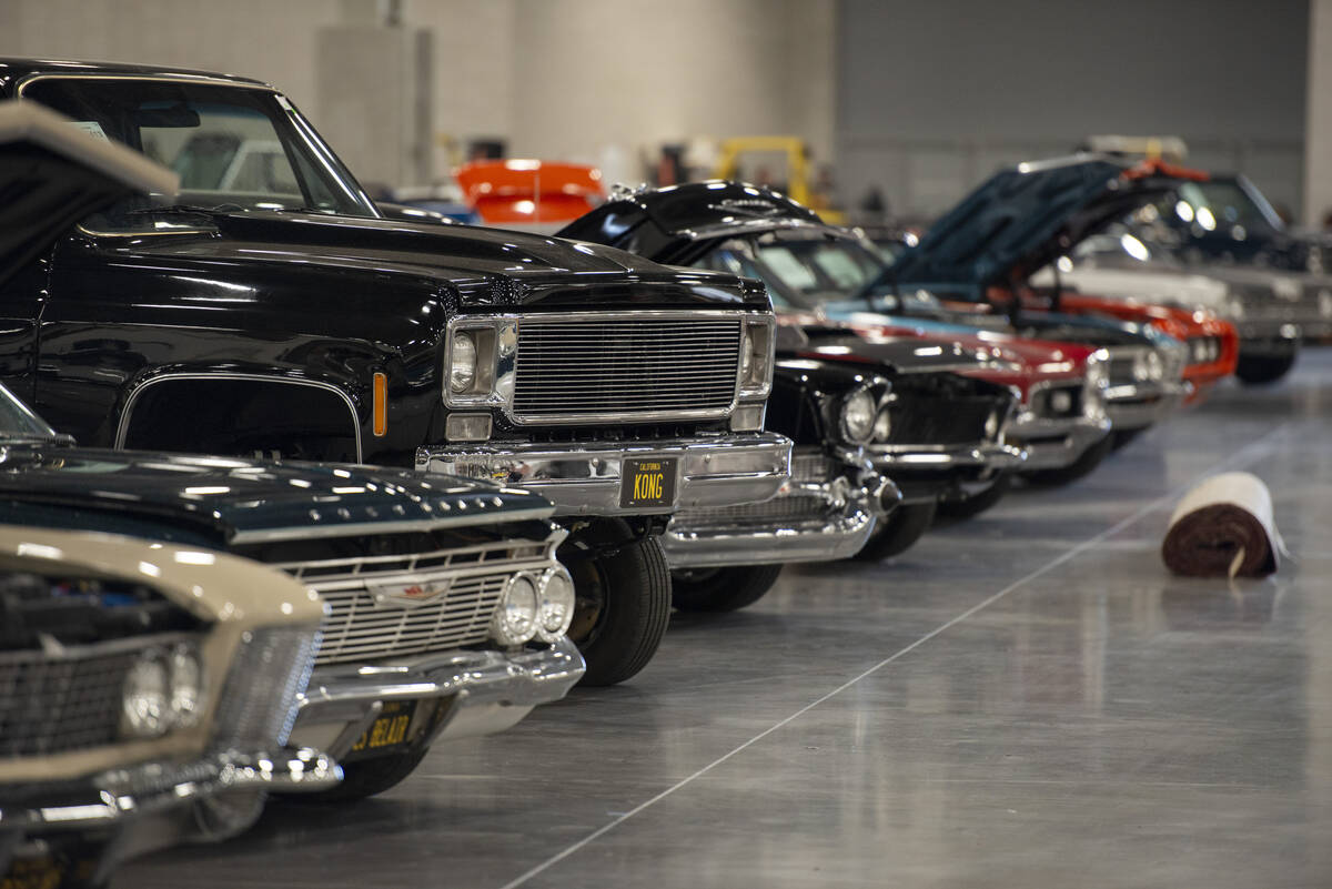 Cars line the convention hall floor for the Barrett-Jackson car auction at the Las Vegas Conven ...