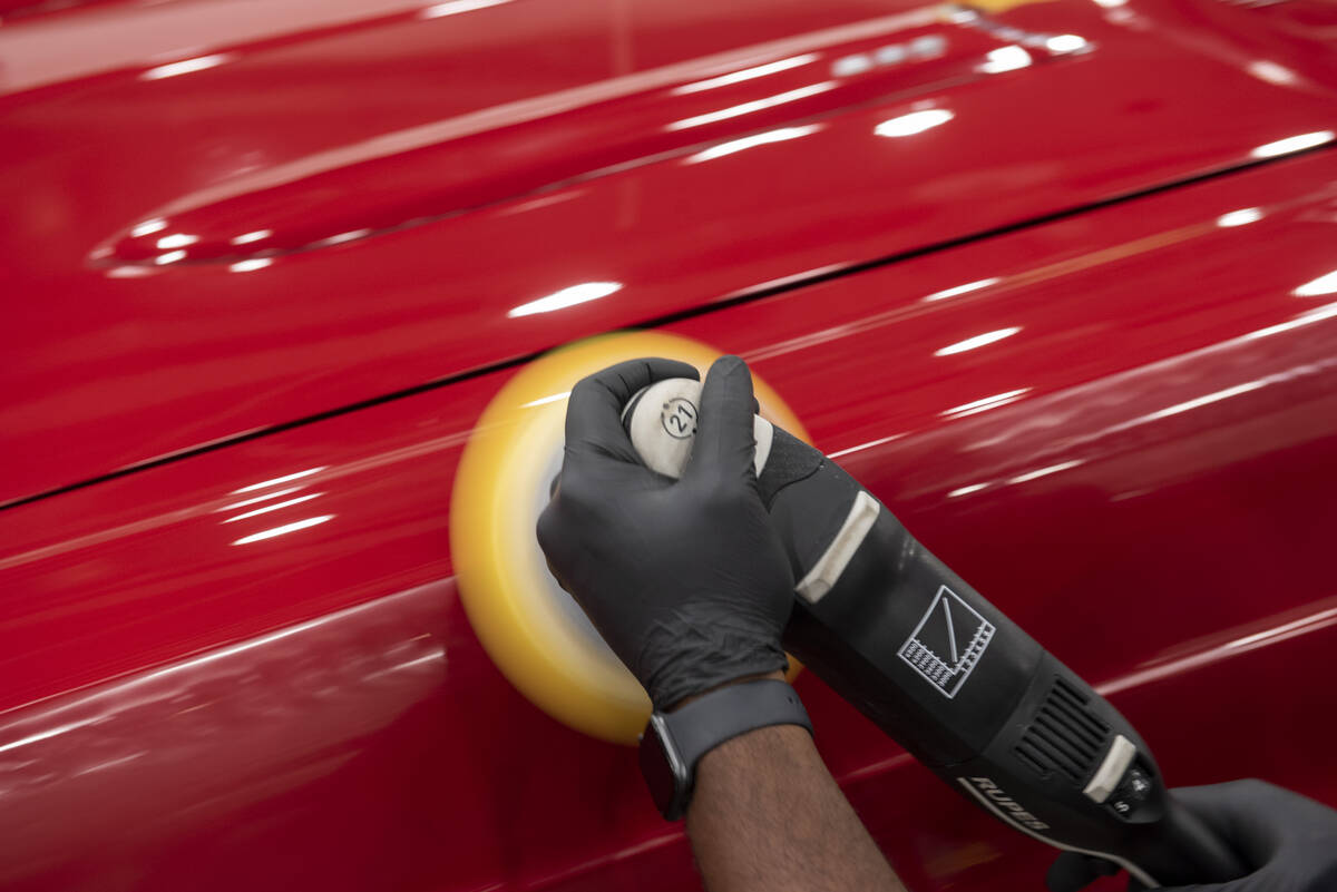 David Cheek of New Jersey polishes a 1966 Ford Ranchero Pickup during the set-up for the Barret ...