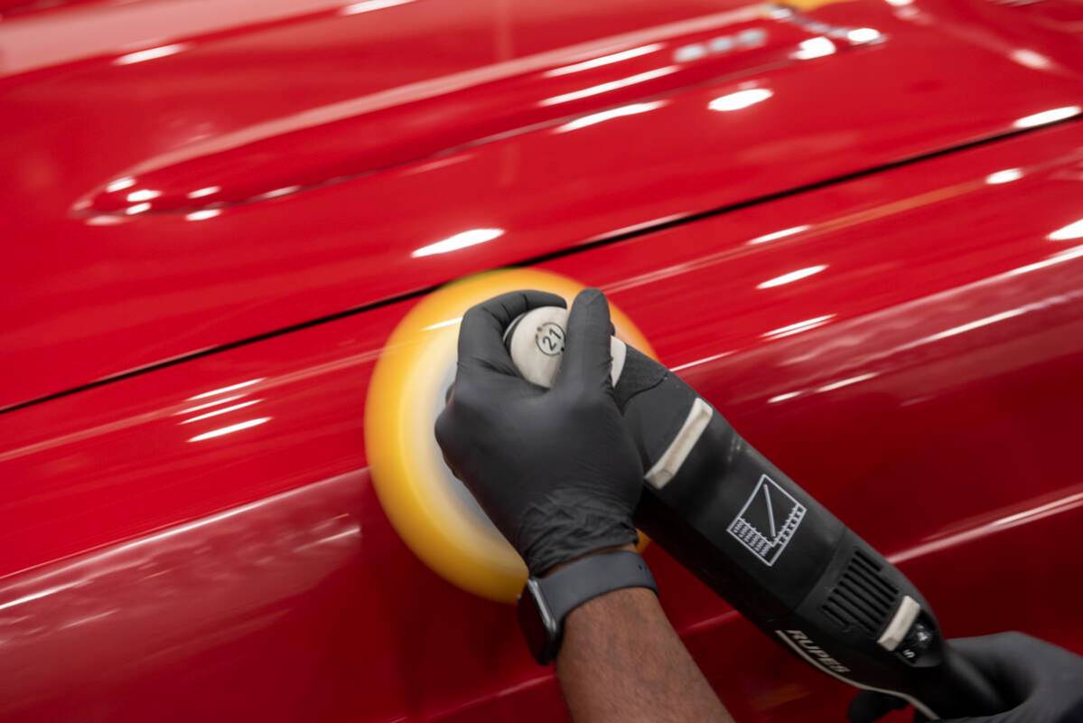 David Cheek of New Jersey polishes a 1966 Ford Ranchero Pickup during the set-up for the Barret ...