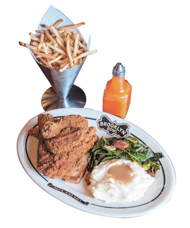 The fried chicken dinner with french fries at Brooklyn Bowl on Friday, July 8, 2022, in Las Veg ...
