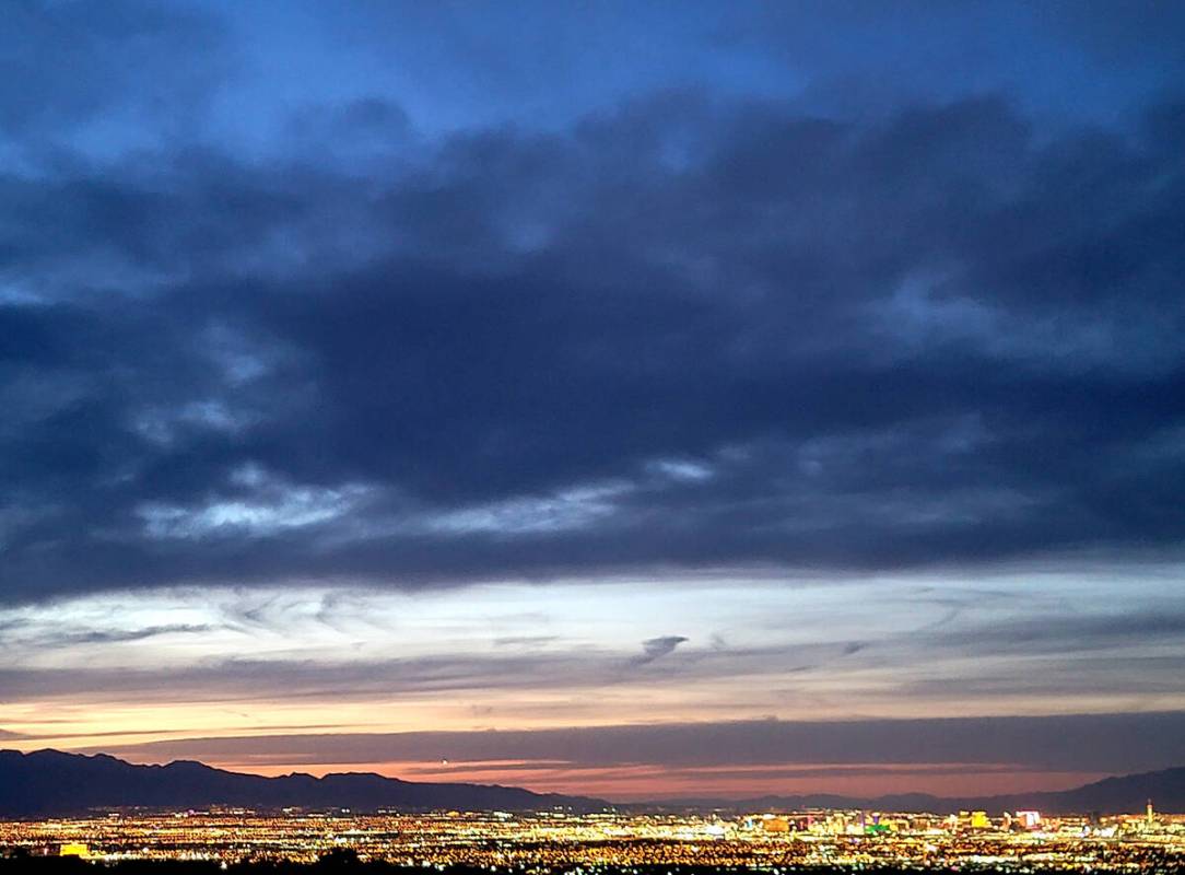 A sunset scene from a Sloan Canyon National Conservation Area vantage point earlier this year. ...