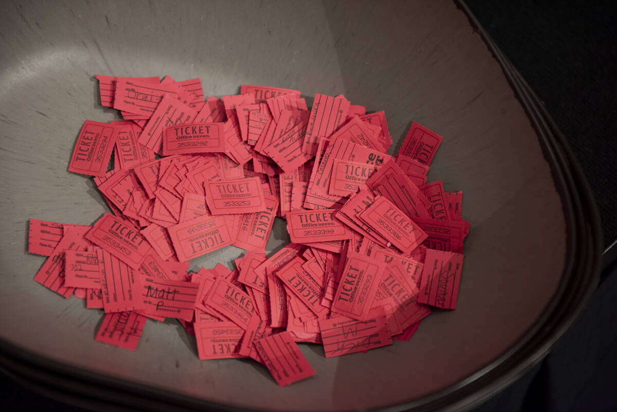 Raffle tickets waiting to be drawn during a lunch hosted by chef and TV personality Guy Fieri t ...