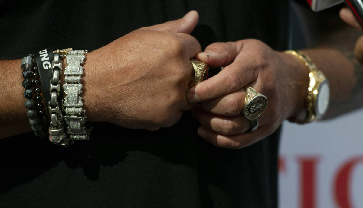 Chef and TV personality Guy Fieri talks to the media during an event honoring veterans and firs ...