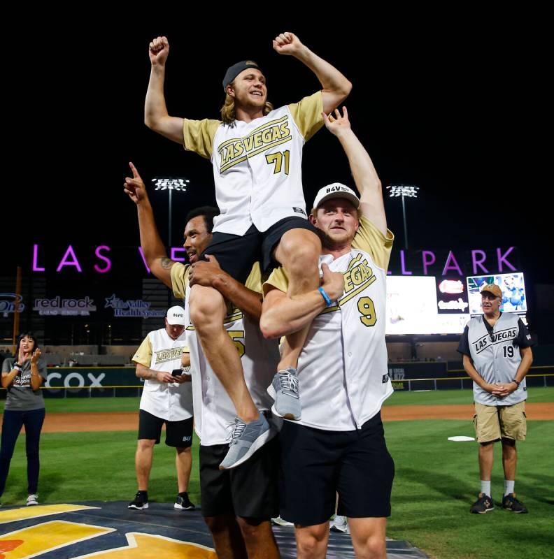 Golden Knights’ William Karlsson, who won MVP, is lifted up on the shoulders of Keegan K ...