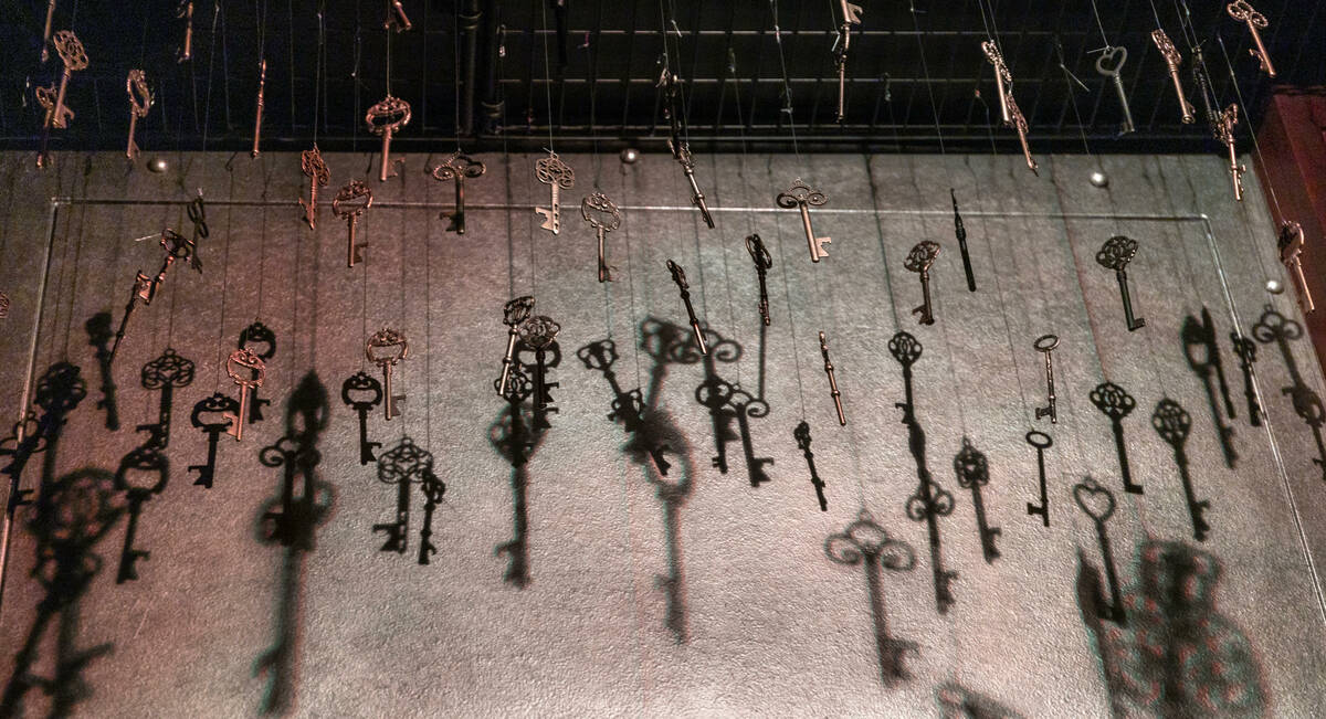 Keys hang from the ceiling within the entry into The Lock hidden speakeasy inside of the newly ...