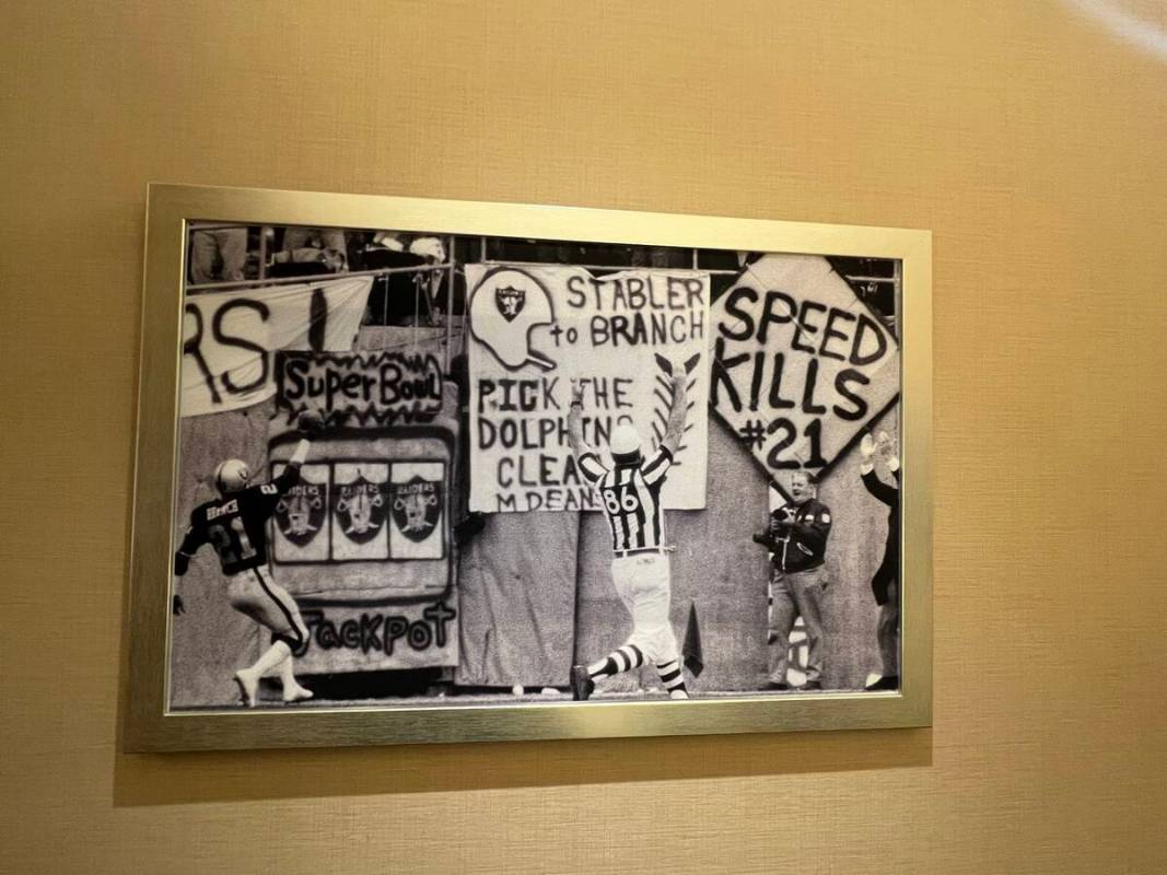 A framed montage honoring Cliff Branch is shown at the Raiders' headquarters in Canton, Ohio. ( ...