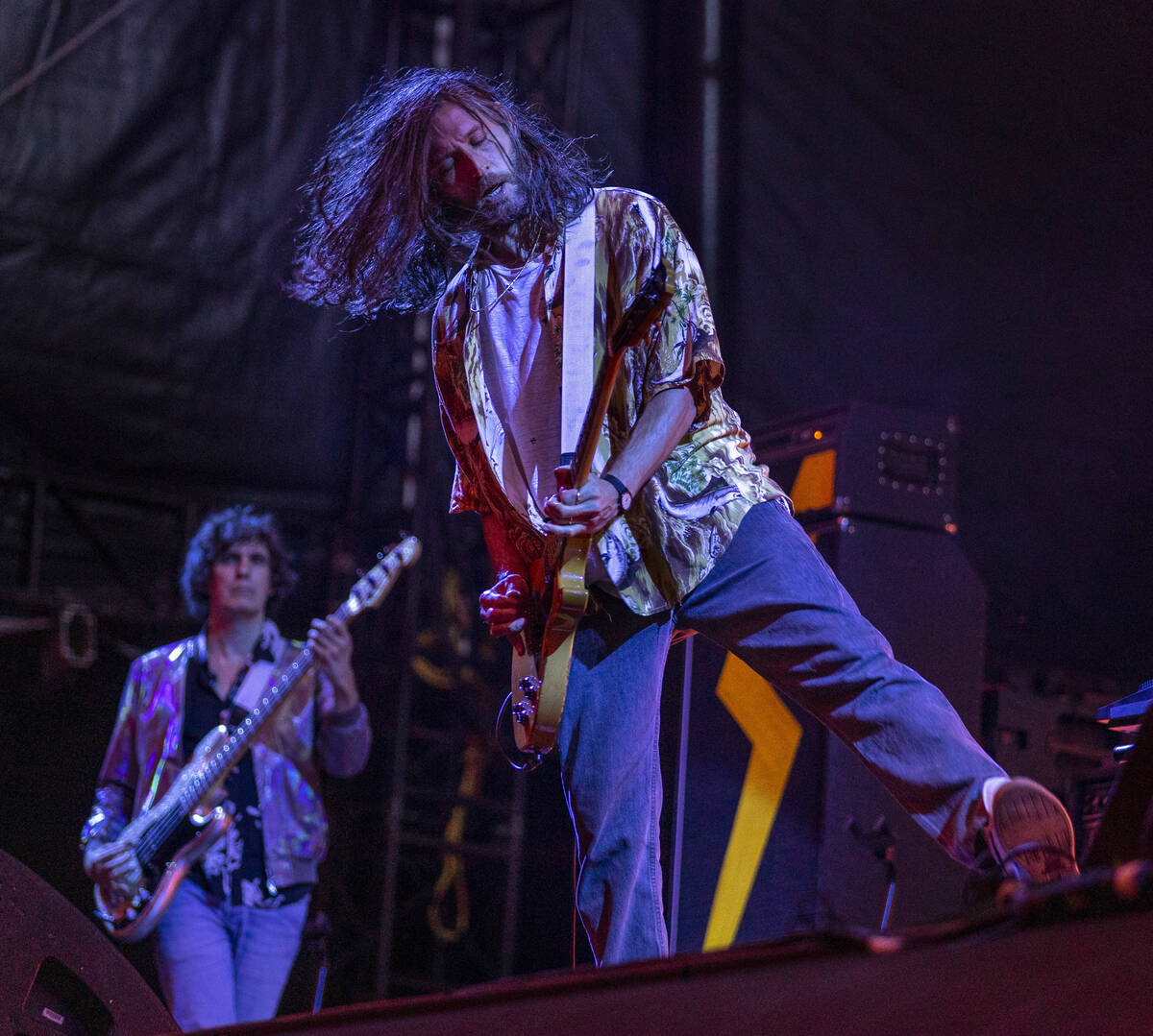 The Strokes bassist Nikolai Fraiture plays with the band at Allegiant Stadium on Saturday, Aug. ...