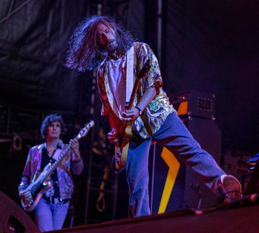 The Strokes bassist Nikolai Fraiture plays with the band at Allegiant Stadium on Saturday, Aug. ...