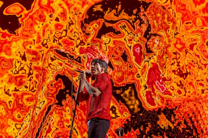 Lead singer Anthony Kiedis sings with The Red Hot Chili Peppers at Allegiant Stadium on Saturda ...