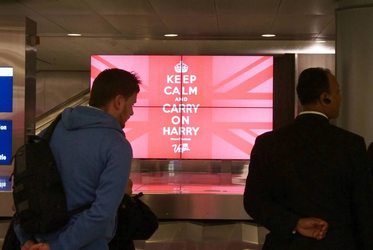 Arriving passengers waiting in the baggage claim area of Terminal 3 of McCarran International A ...