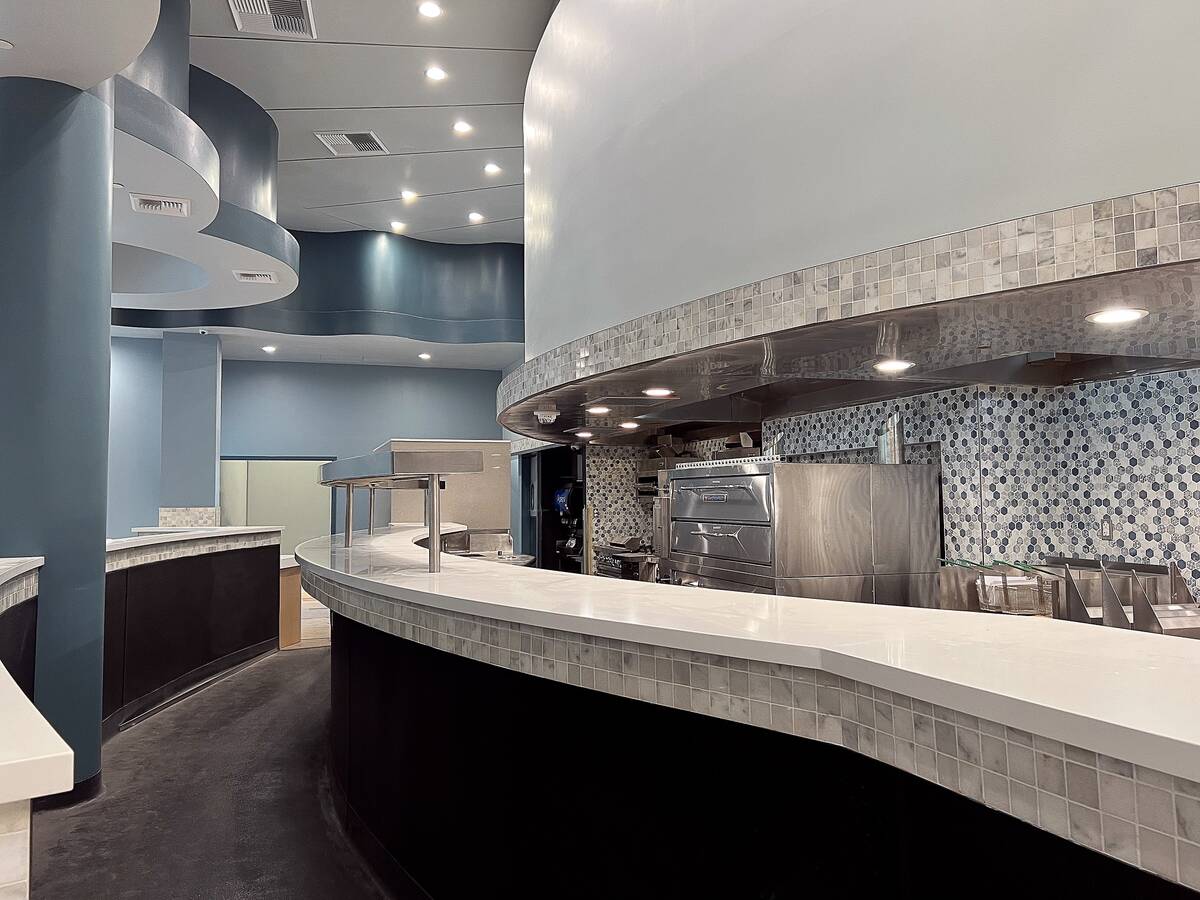 The kitchen is under construction at Spiedini Fiamma Italian Bistro, scheduled to debut in Sept ...