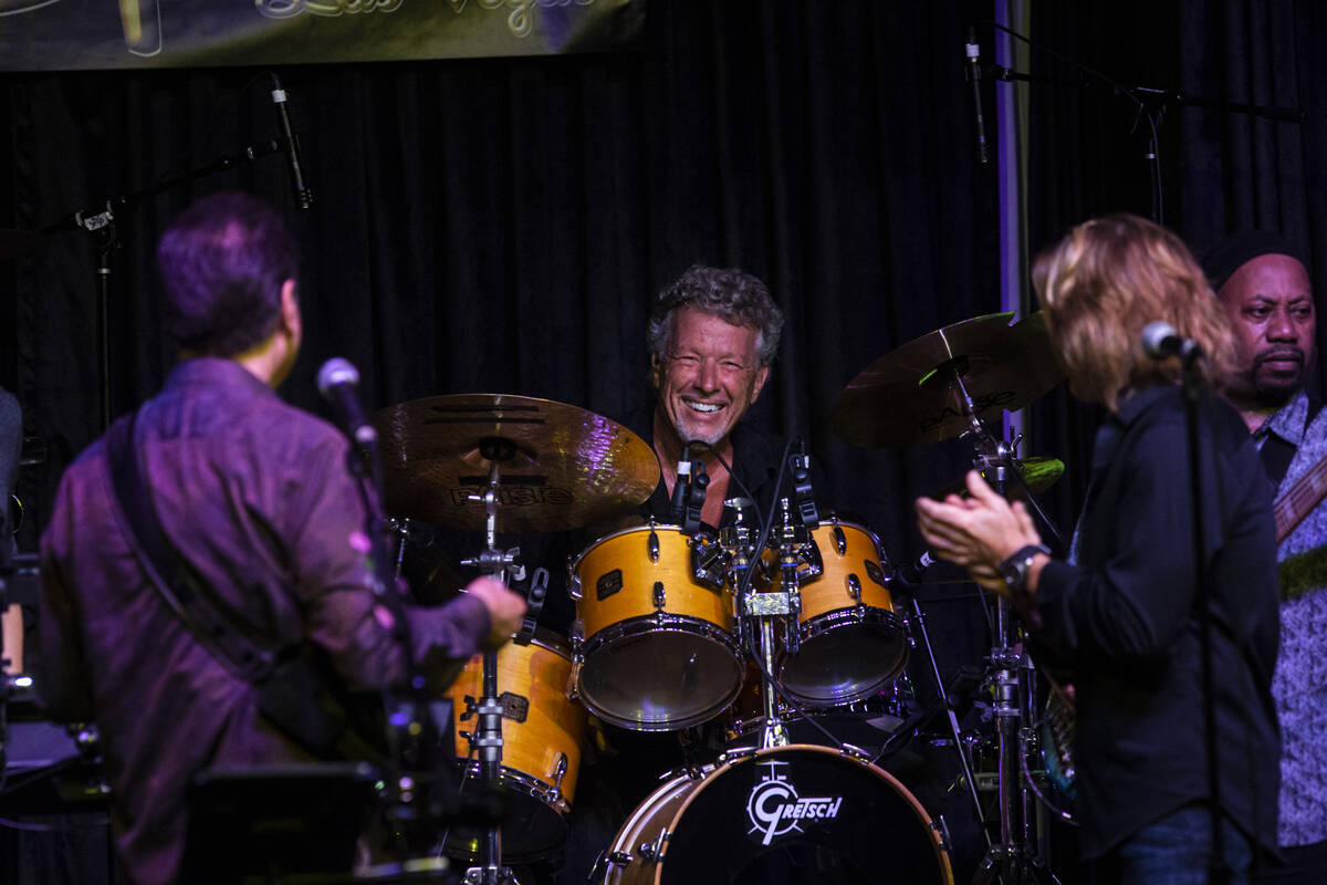 Drummer Johnny Friday of the Santa Fe & The Fat City Horns is acknowledged during a perform ...