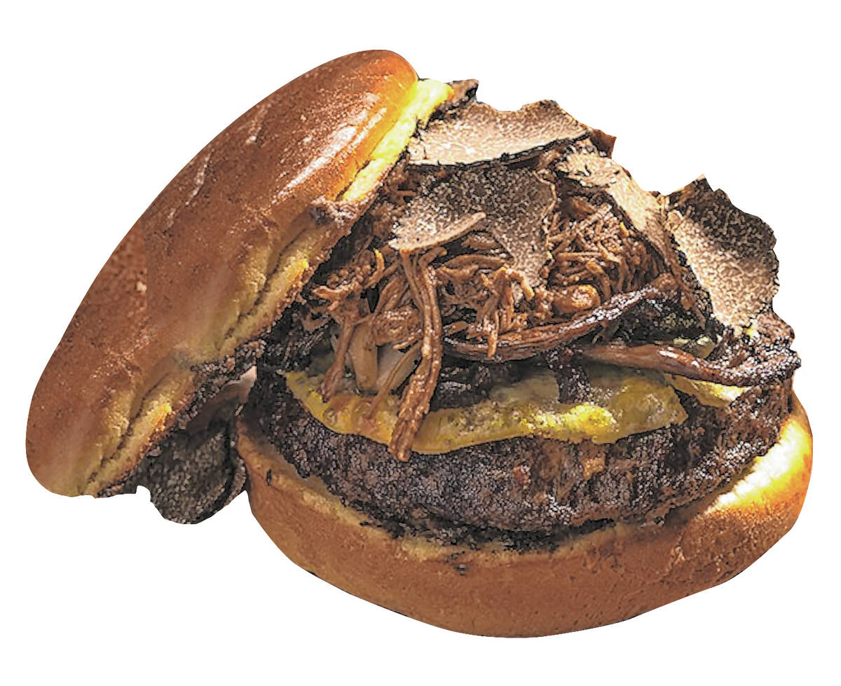 The truffle burger at Toca Madera steakhouse on the Las Vegas Strip features wagyu beef, short ...