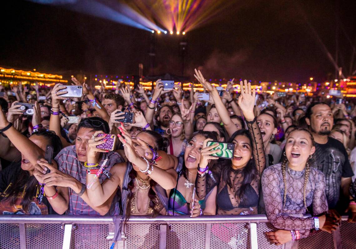 In this Sept. 17, 2021, file photo, fans cheer for Tame Impala performing on the Downtown Stage ...