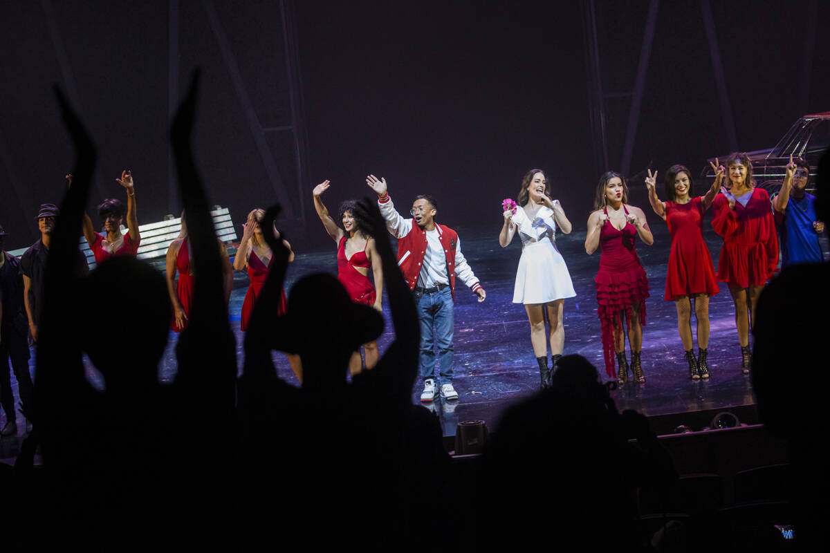 Cast members of Michael Jackson One react to a standing ovation after dancing to “The Gi ...