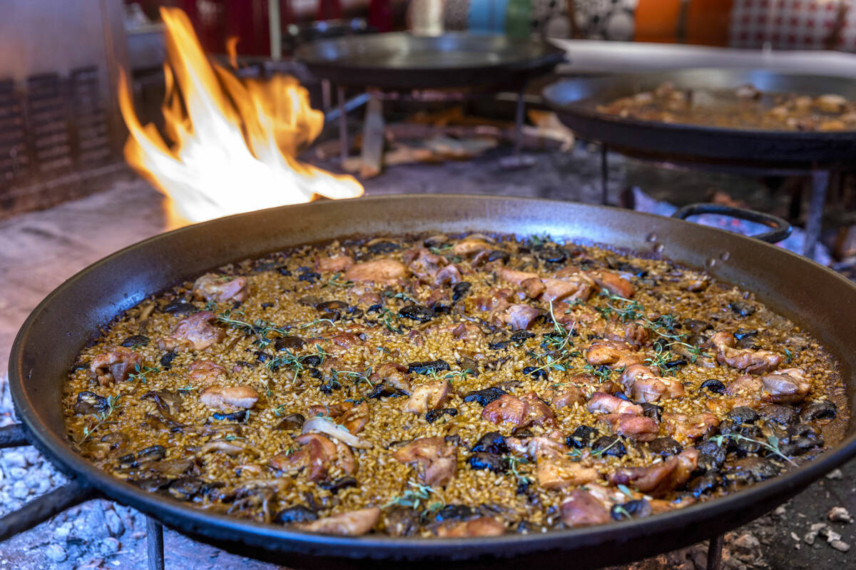 Paella prepared over an open flame by Chef Stephanie Sandfrey at Jaleo in The Cosmopolitan on T ...