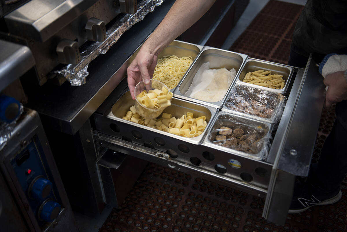 Robert Moore, chef and owner of Rosa Ristorante, prepares the restaurant's Rigatoni Alla Vodka ...