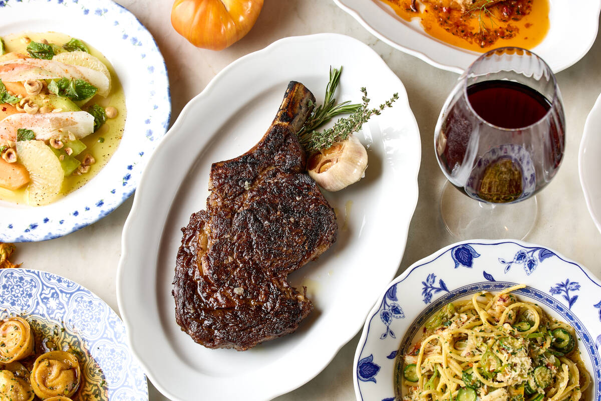 A bone-in ribeye is cooked in the wood-fire oven at Balla Italian Soul, which opens on Sept. 30 ...