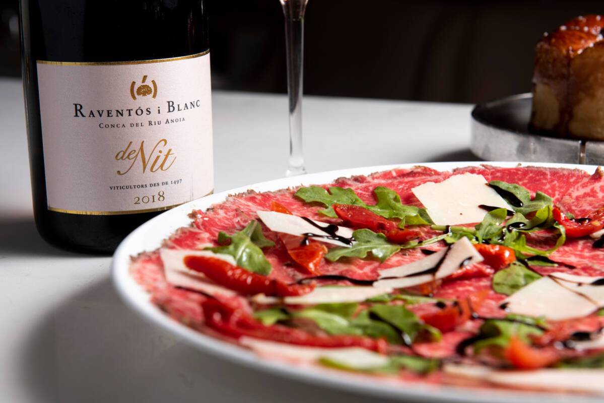 The carpaccio, alongside a Raventós i Blanc, at the SW Steakhouse at The Wynn on Tuesday, ...