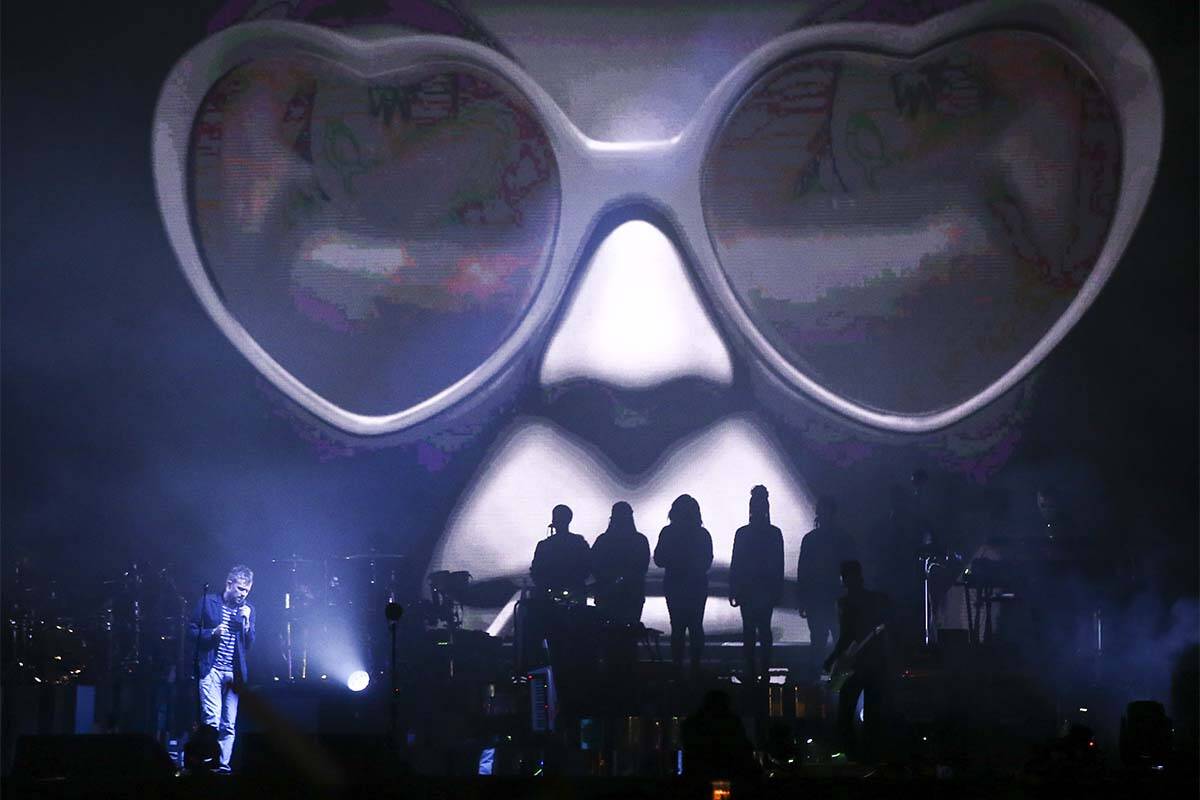 Damon Albarn of Gorillaz, lower left, performs at the Downtown stage during the final day of th ...