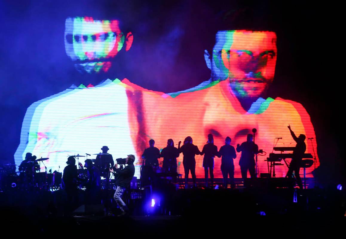 Damon Albarn of Gorillaz, lower left, performs at the Downtown stage during the final day of th ...