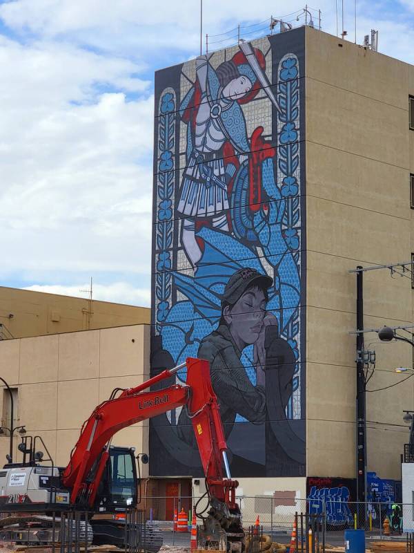 Construction in downtown Las Vegas continues across Carson Avenue from “The Sleeping Kni ...