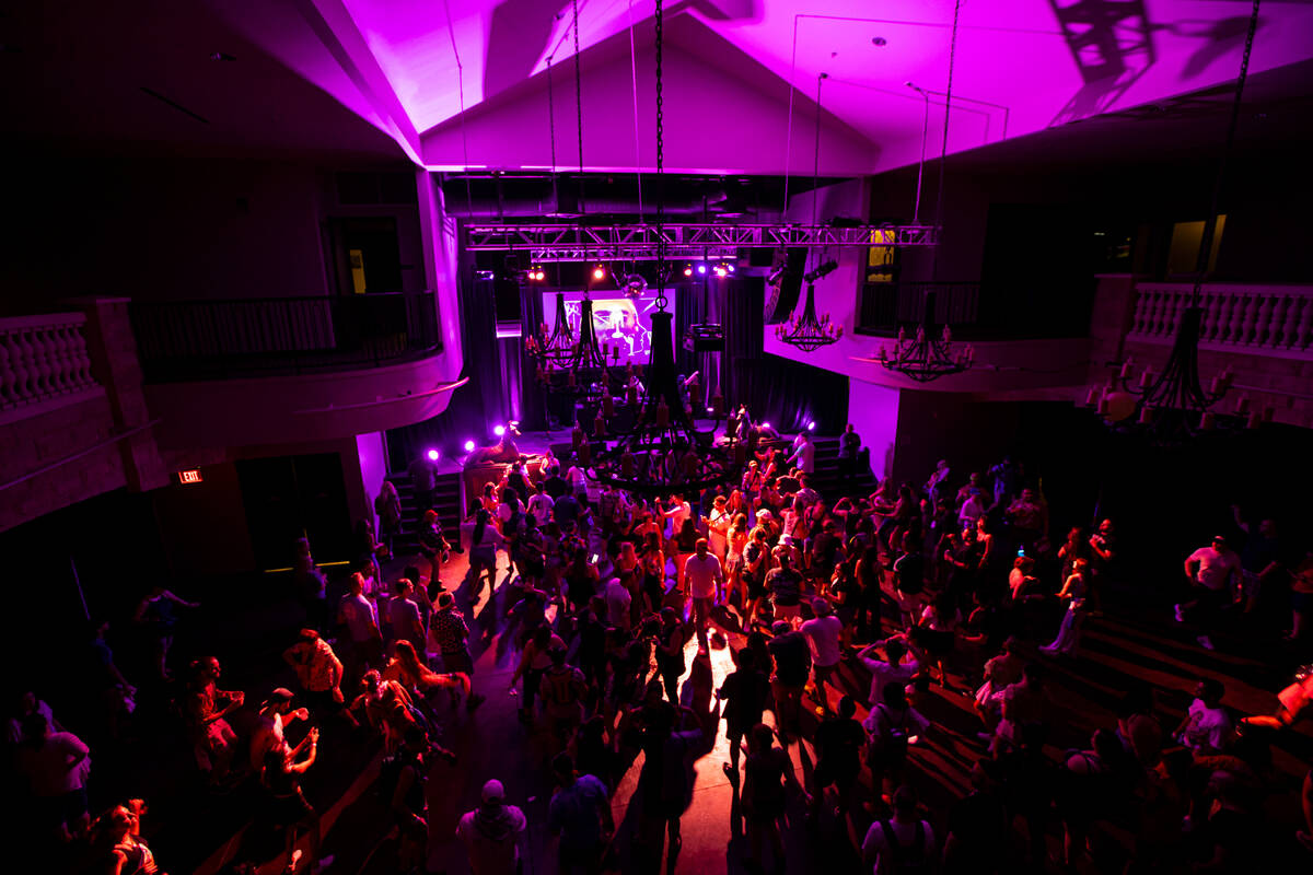 Attendees dance during a 90’s nite party during the first day of the Life is Beautiful f ...