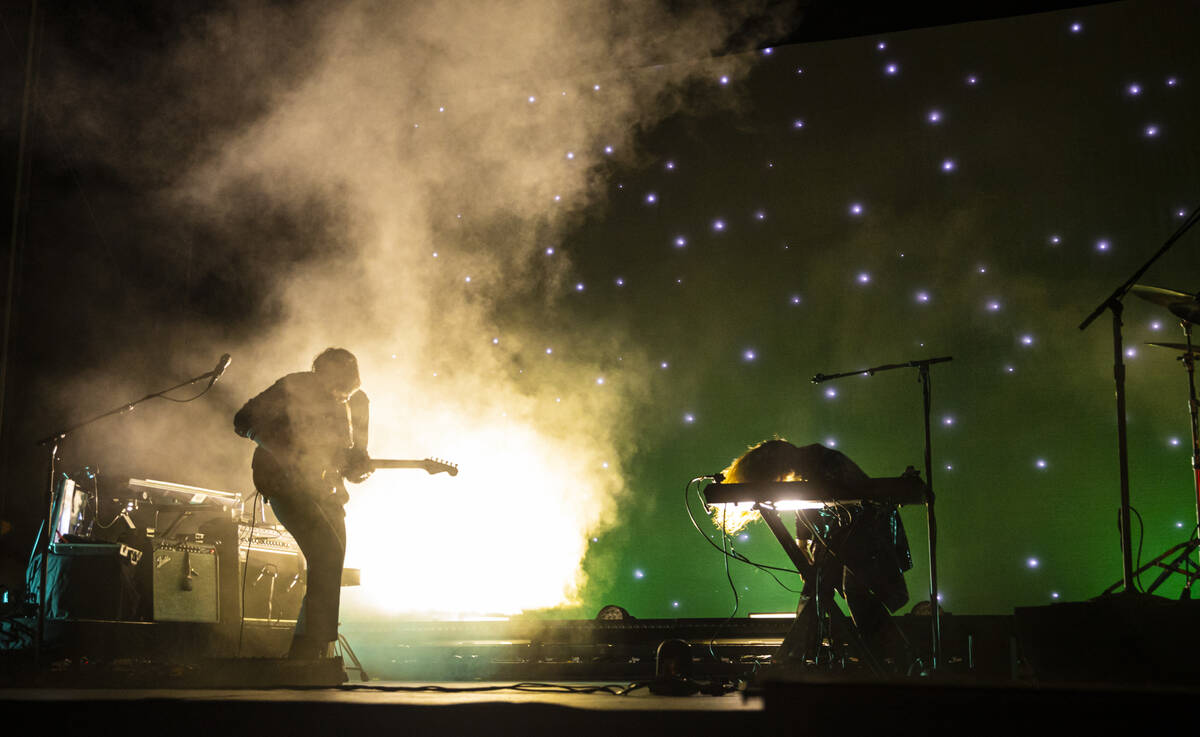 Alex Scally, left, and Victoria Legrand of Beach House performs during the Life is Beautiful fe ...