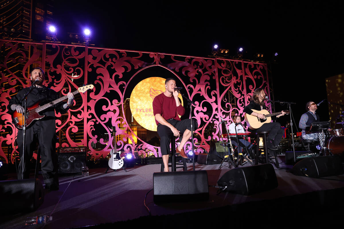 Ben McKee (L-R), Dan Reynolds, Wayne Sermon and Daniel Platzman of Imagine Dragons perform duri ...