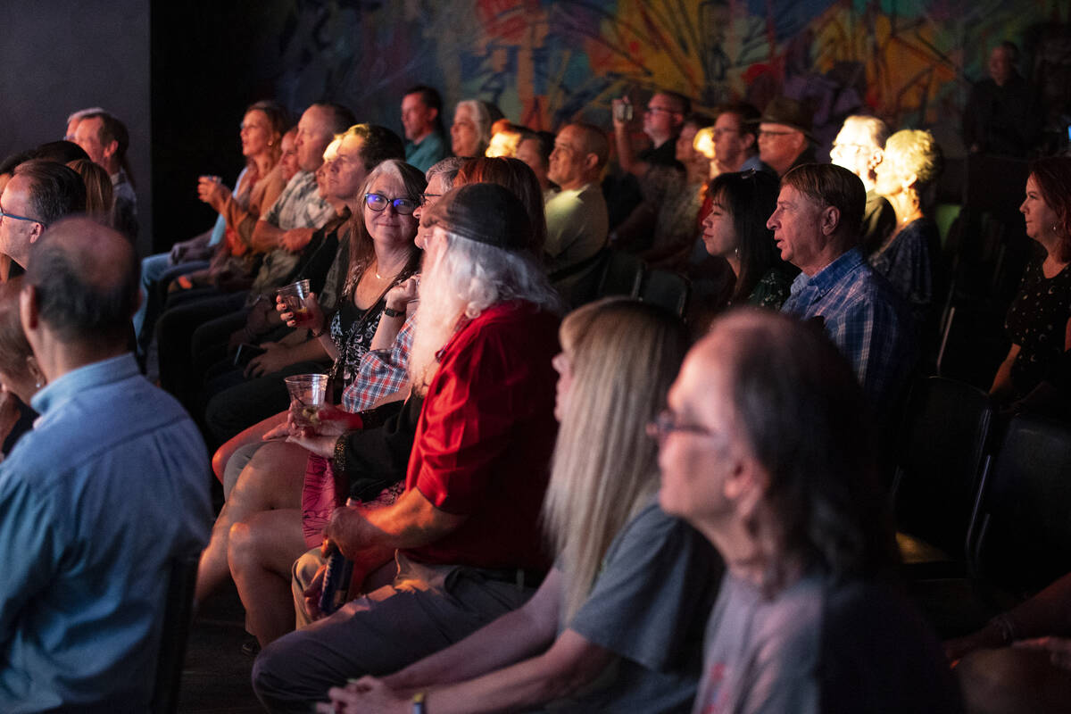 People watch The Docksiders perform during a show at the Rio hotel-casino in Las Vegas, Saturda ...