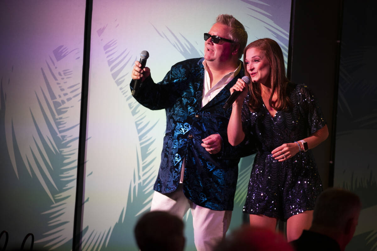 Bobby Rouse, left, and Erin Sucher, of The Docksiders, perform during a show at the Rio hotel-c ...