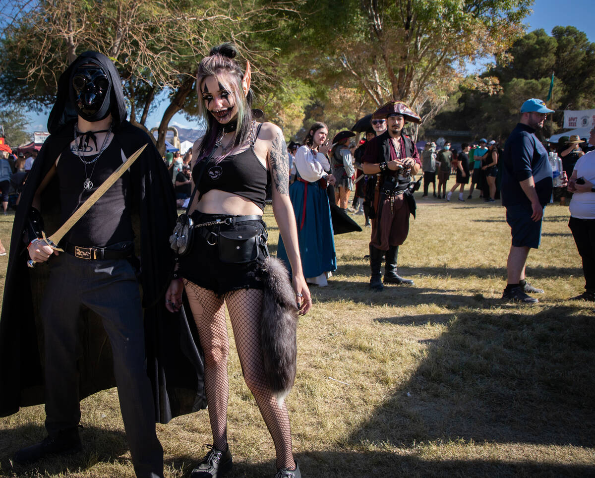 Alex Payette, left, and Rachel Carpenter, right, pose for a portrait during the Age of Chivalry ...