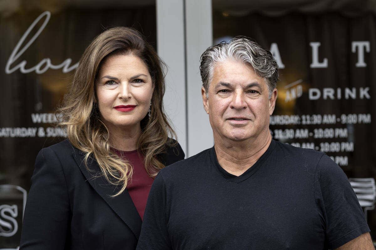 Owners of Honey Salt, married couple Elizabeth Blau and chef Kim Canteenwalla, outside their re ...