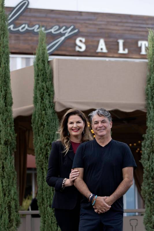 Owners of Honey Salt, married couple Elizabeth Blau and chef Kim Canteenwalla, outside their re ...