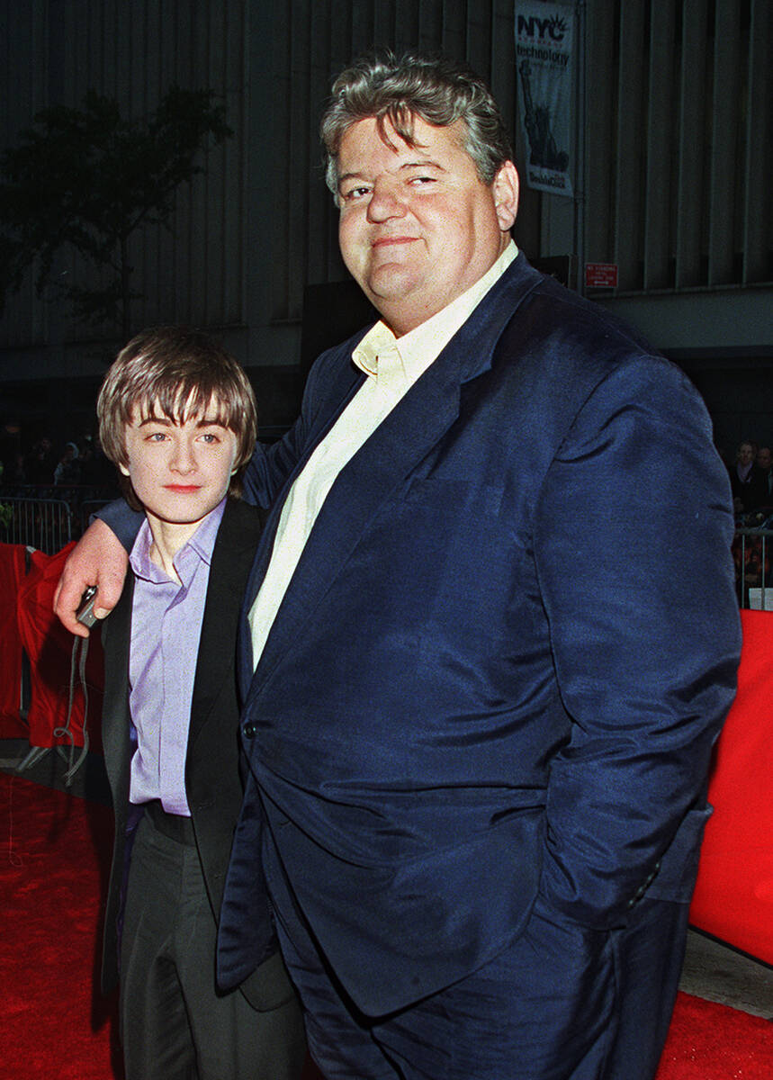 Daniel Radcliffe, left, who plays Harry Potter in the new movie "Harry Potter and the Sorcerer' ...
