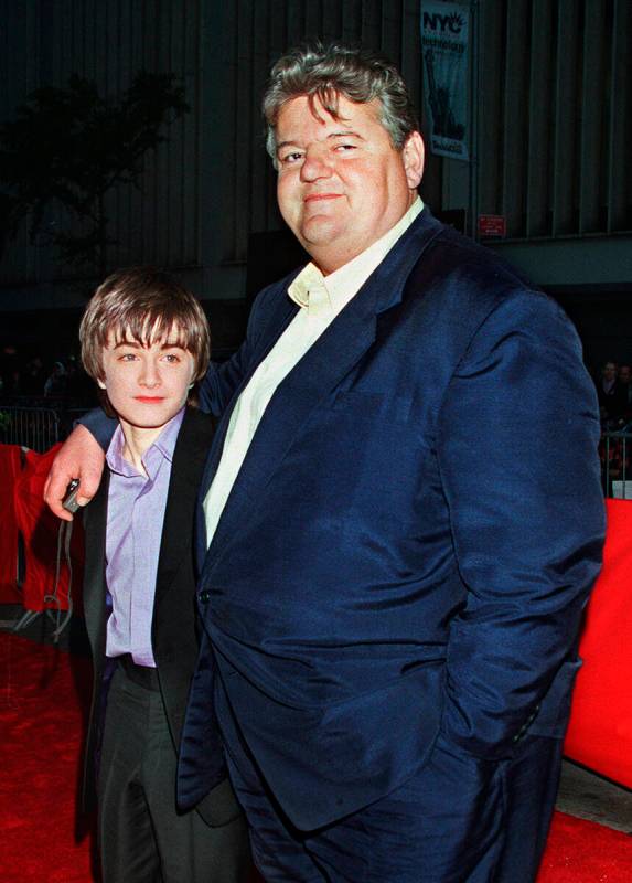 Daniel Radcliffe, left, who plays Harry Potter in the new movie "Harry Potter and the Sorcerer' ...